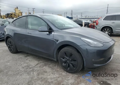 2023 Tesla Model Y from USA, damaged, VIN 7SAYGDED2PF949131